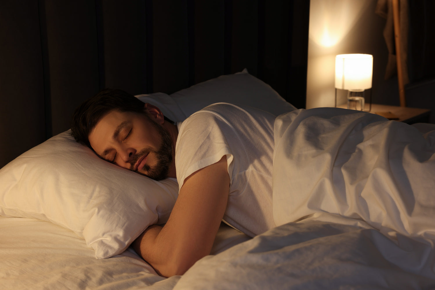 Man sleeping peacefully because of PausePM, so no longer peeing at night